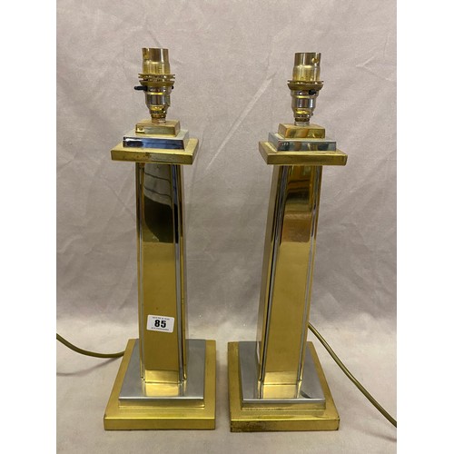 85 - A pair of Art Deco chrome and brass lacquered tablelamp bases of tapering panelled form - 17in. high