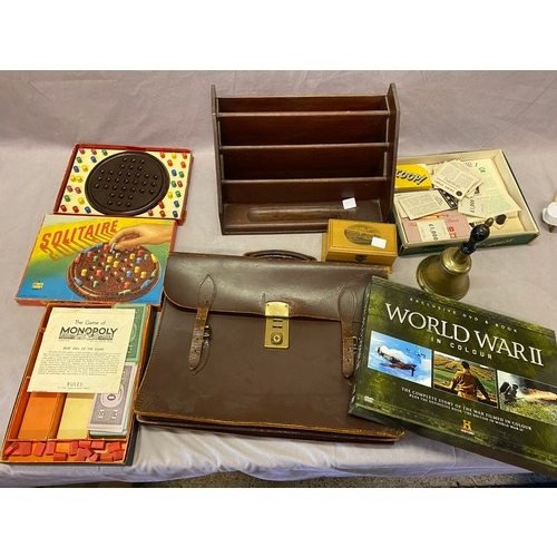 252 - A Mauchline ware box 'Grand Parade Eastbourne', a mahogany stationery rack, a leather briefcase, two... 