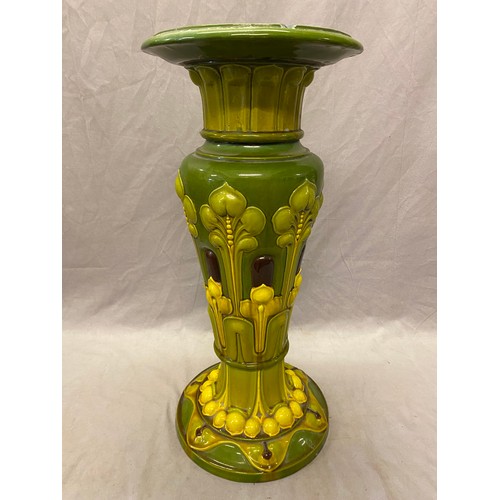 145 - A Victorian green and yellow glazed pottery jardiniere stand - 26in. high