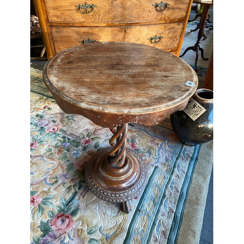 36 - A Victorian mahogany occasional table with circular top, on twist column and circular base and three... 