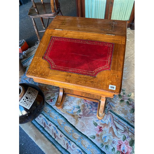 106 - A Victorian walnut and satinwood inlaid Davenport with red and gilt tooled leather hinged writing su... 