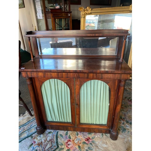 47 - A Victorian mahogany chiffonier, the raised back with shelf and mirror, the base fitted two arched d... 