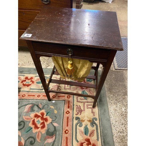 42 - A mahogany work table fitted frieze drawer and sliding well, on square legs united by undertier - 18... 