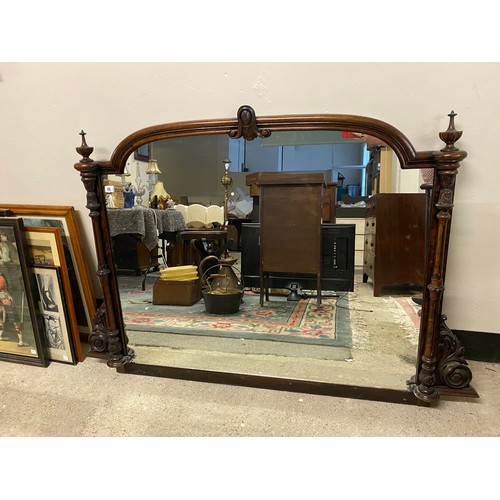 25 - A Victorian mahogany framed overmantel with fluted pilasters, scroll supports - 36in. x 55in.