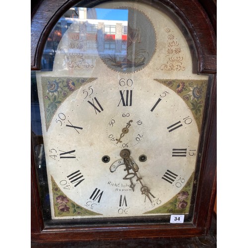 34 - A 19th Century longcase clock by Richard Johnson of Ripon, with cream enamel dial painted with an ur... 