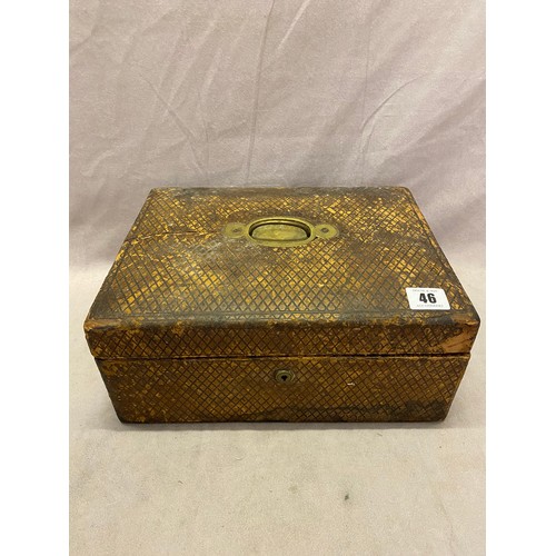 46 - A Victorian leather covered jewellery box with recessed gilded handle - 12in. wide