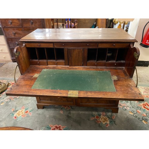 49 - A 19th Century mahogany secretaire chest with fitted interior above two panelled doors - 47in. wide