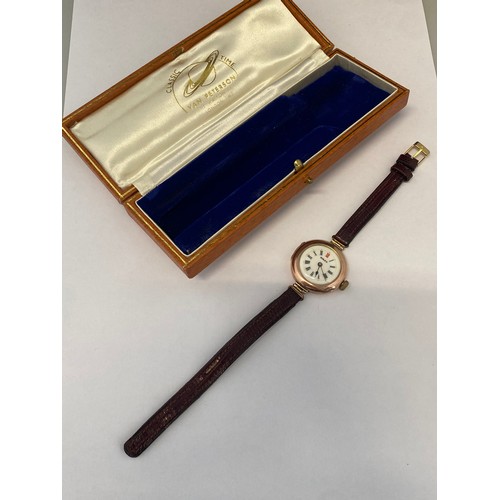243 - A lady's Rolex wristwatch, cream enamel dial, in a 9ct. gold case, on a leather strap, in a Classic ... 