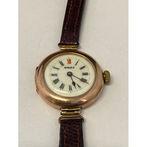 243 - A lady's Rolex wristwatch, cream enamel dial, in a 9ct. gold case, on a leather strap, in a Classic ... 