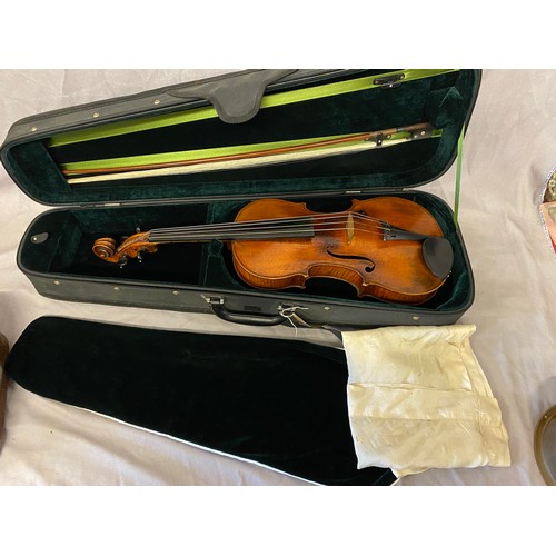 57 - A viola and bow in black canvas carrying case