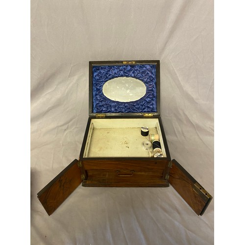 310 - A Victorian mahogany sewing and jewellery box with hinged lid enclosing mirror and tray, the front f... 