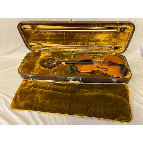 59 - A violin and bows in brown crocodile skin effect case