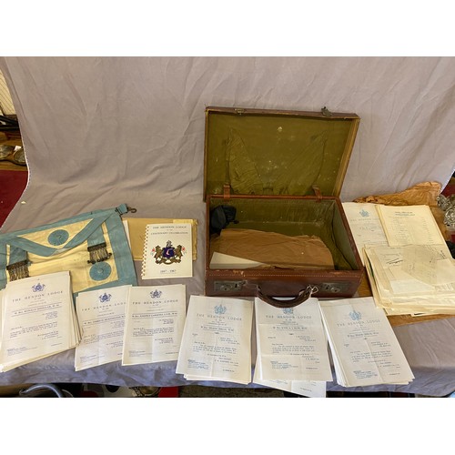 54 - A brown leather suitcase containing a Masonic apron and papers for The Hendon Lodge