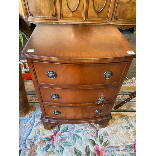 70 - A reproduction mahogany bow front chest fitted three drawers, on bracket feet - 19 1/2in. wide