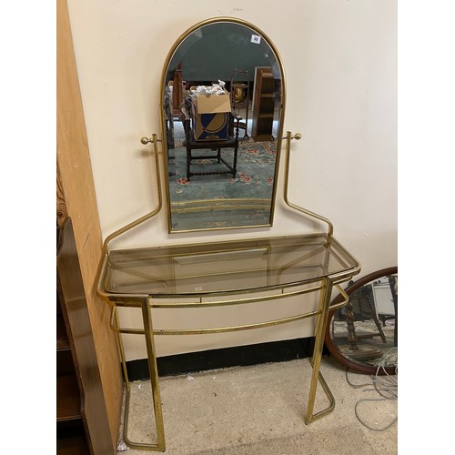 40 - A brass lacquered dressing table with arched mirror and smoked glass top - 40in. wide and a pair of ... 