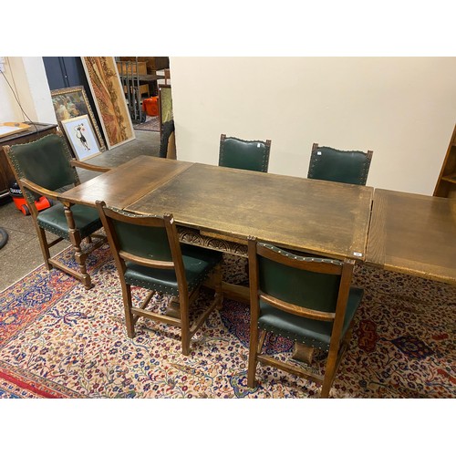 49 - An oak refectory table with rectangular top, carved frieze, on heavy carved bulbous legs - 48in. x 3... 