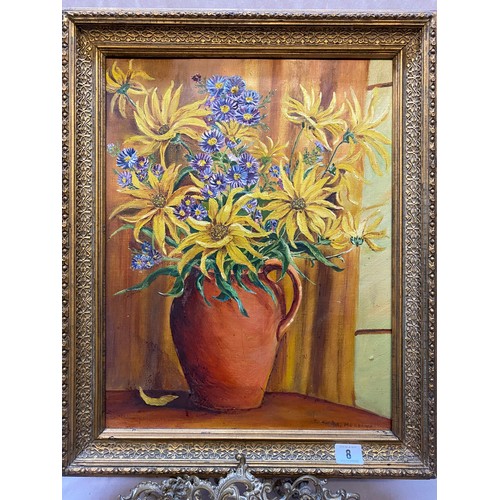 8 - M. Meadows.  A signed oil on canvas - Still life of flowers in a terracotta jug, framed - 17 1/2in. ... 