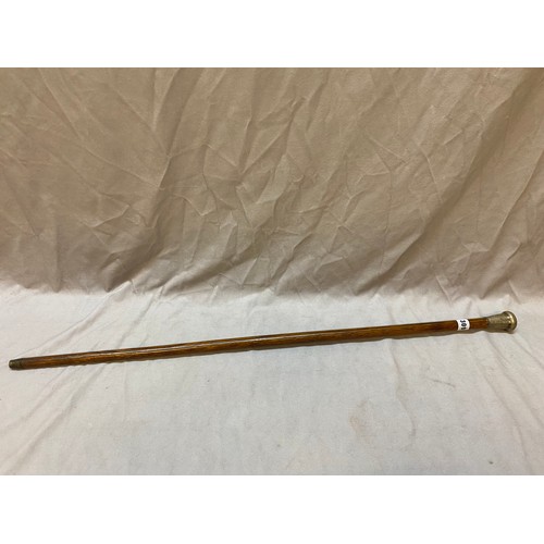 309 - A malacca walking cane with engraved silver top