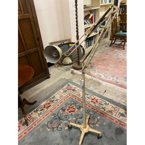 76 - A cream sprayed adjustable floor standing spot lamp