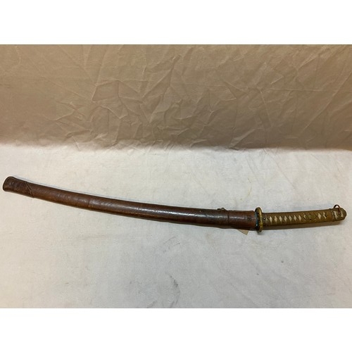 280 - A Japanese Samurai sword in brown leather scabbard