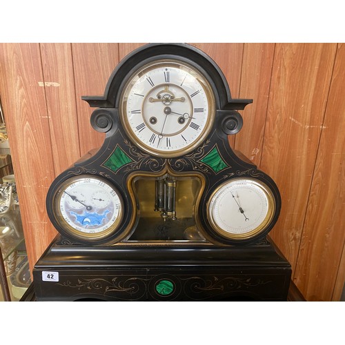 42 - A Victorian mantel clock with white enamel dial, visible escapement, day, date, month and moonphase ... 