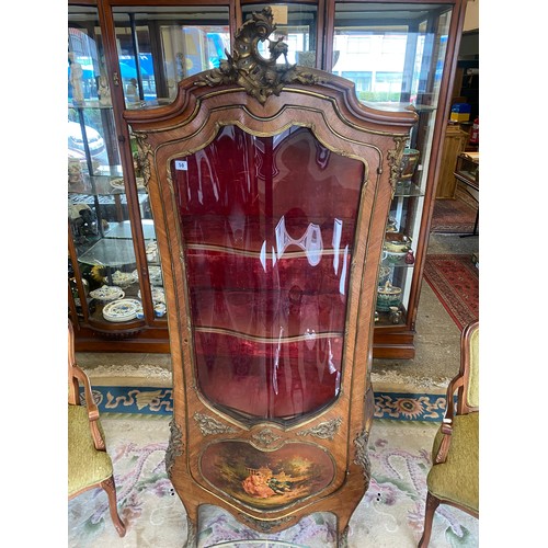 50 - A Victorian French vitrine with leaf carved pediment, shaped glass door and sides with Vernis Matin ... 