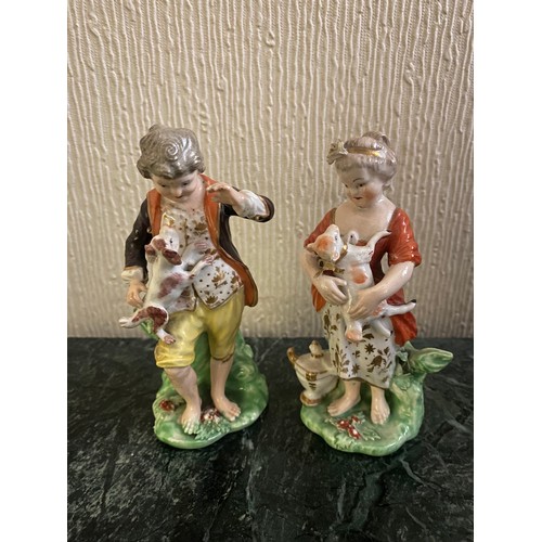 132 - A pair of 19th Century Derby figures of a boy with a dog and a girl with a lamb - 5in. high