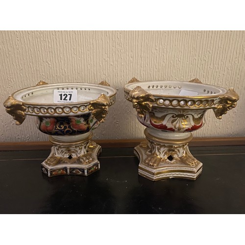 140 - A pair of 19th Century Derby pot pourris, the pierced borders with mask decoration, decorated flower... 