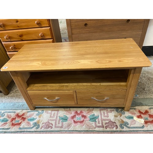 30 - A modern oak television stand fitted recess drawer under - 38in. wide