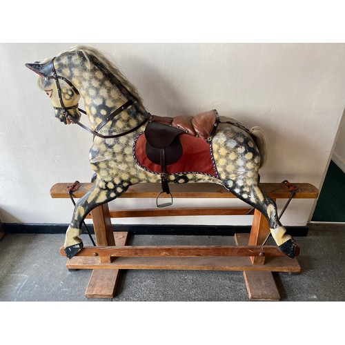 44 - An early 20th Century Collinson rocking horse