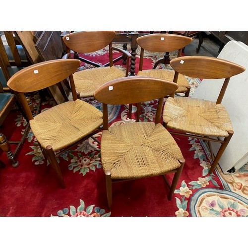 20 - A set of five (including one carver) Danish teak framed dining chairs by Peter Hvidt and Orla Molgaa... 