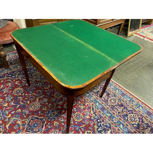 22 - A Georgian satinwood and rosewood crossbanded card table with 'D' shaped folding top, on square tape... 