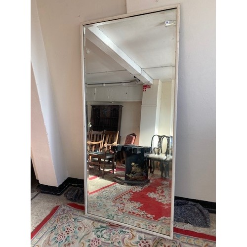 39 - A large 19th Century wall mirror in a cream painted frame - 39in. x 82in.