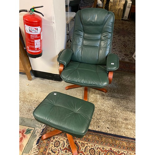 51 - A green Stressless style chair and matching stool