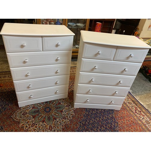 56 - Two Kingstown white melamine chests, each fitted two narrow and four wide drawers - 32 1/2in. wide