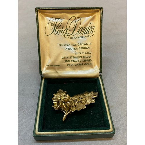 211 - A Danish Floral Danica silver plated and 24ct. gold dipped brooch in the form of leaves and flowers,... 