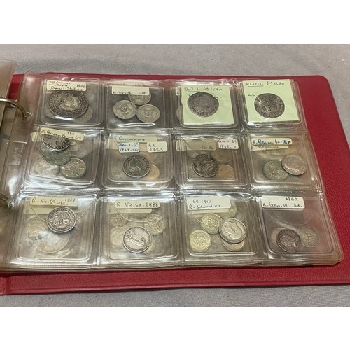 288 - Two red albums containing silver and other coins including Elizabeth I, Charles I, James I and later