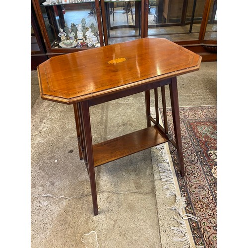 26 - A mahogany half round display cabinet with low raised back, fitted glass door and sides with shaped ... 