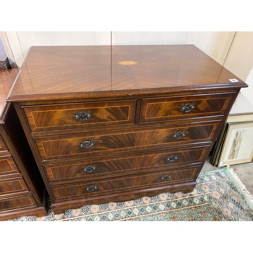 48 - A reproduction mahogany and satinwood line inlaid straight front chest with paterae to the top, fitt... 