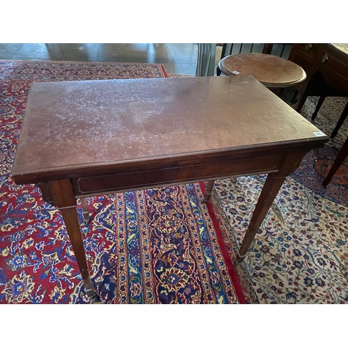 32 - A 19th Century mahogany card table with rectangular folding top, on square tapered legs terminating ... 