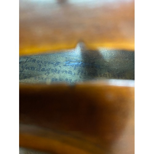 276 - A violin bearing the label to the inside for Guadagnini, dated 1870, in fitted carrying case, back l... 