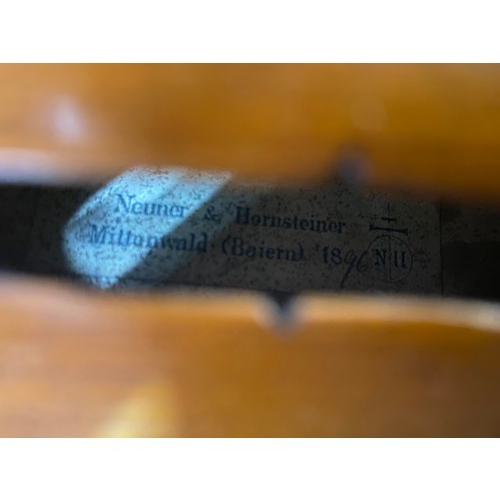 275 - A violin bearing label to the inside Neuner and Hornsteiner Mittanwald (Baiern) 1896, complete with ... 