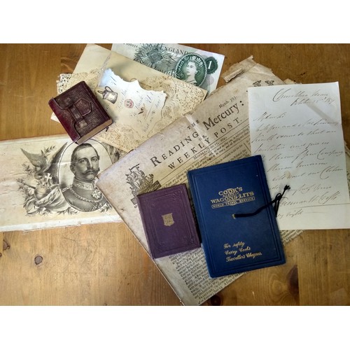 39 - Two photograph albums, an album of slotted-in cigarette cards, a box of thirty six glass slides of S... 