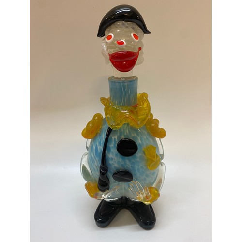 195 - A Murano decanter in the form of a clown in blue and white with black hat and yellow bow tie - 14in.... 