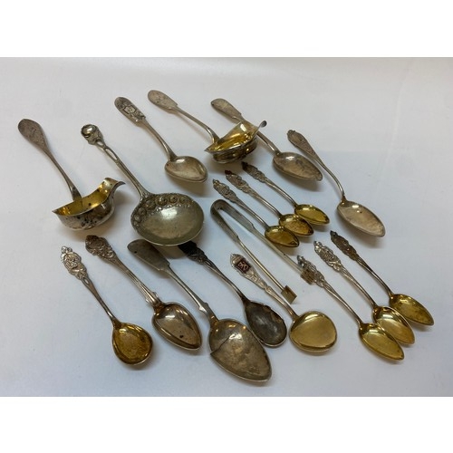 226 - A selection of Finnish silver flatware including ladles, teaspoons, tongs, serving spoon etc..