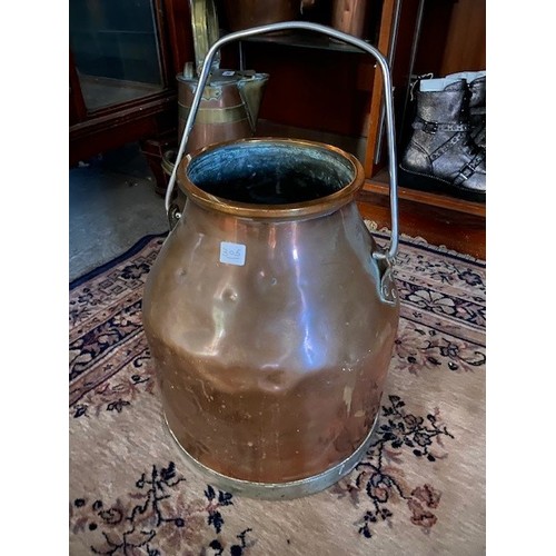 320 - A selection of copper including a pail, three kettles, trivet etc..