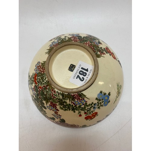 182 - A late 19th Century Japanese Satsuma bowl decorated pagodas, butterflies and flowers - 6in. dia.