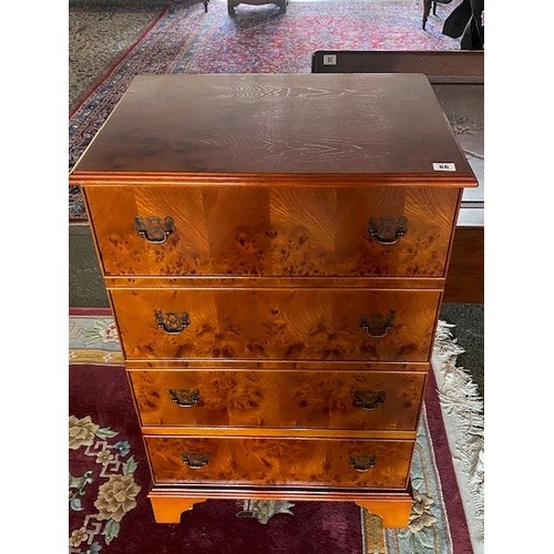 66 - A micro hifi in a reproduction yewwood veneered cabinet - 24in. high and a nest of three reproductio... 