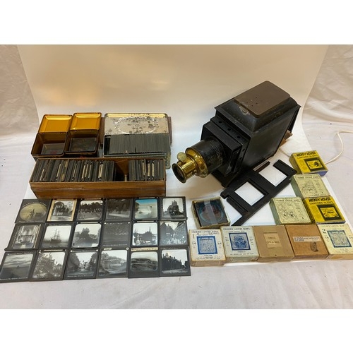 317 - A Magic Lantern together with a quantity of slides including early Bournemouth, Brockenhurst, Wareha... 