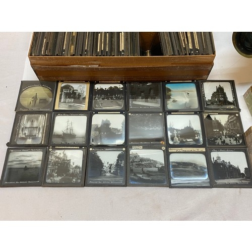 317 - A Magic Lantern together with a quantity of slides including early Bournemouth, Brockenhurst, Wareha... 